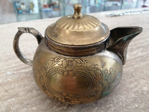 Teiera etnica ottone